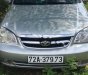 Daewoo Lacetti 2010 - Bán Daewoo Lacetti MT đời 2010, màu bạc số sàn