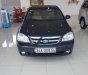 Daewoo Lacetti 2011 - Cần bán gấp Daewoo Lacetti sản xuất 2011, màu đen, 185tr