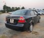 Daewoo Gentra SX 1.5 MT 2010 - Cần bán gấp Daewoo Gentra SX 1.5 MT đời 2010, màu đen