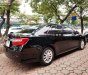 Toyota Camry 2.0E 2014 - Bán ô tô Toyota Camry 2.0E sản xuất năm 2014, màu đen