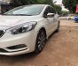 Kia K3 1.6 MT 2014 - Cần bán xe Kia K3 1.6 MT sản xuất năm 2014, màu trắng, giá 425tr