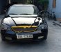 Daewoo Magnus   2004 - Cần bán lại xe Daewoo Magnus 2.4 AT đời 2004, màu đen, giá 118tr