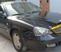 Daewoo Magnus   2004 - Cần bán lại xe Daewoo Magnus 2.4 AT đời 2004, màu đen, giá 118tr