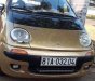 Daewoo Matiz 2000 - Cần bán xe Daewoo Matiz sản xuất 2000, màu vàng, nhập khẩu nguyên chiếc