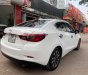 Mazda 2 1.5 AT 2015 - Xe Mazda 2 1.5 AT năm 2015, màu trắng chính chủ giá cạnh tranh