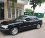 Ford Laser   2004 - Bán Ford Laser GHIA 1.8 AT sản xuất 2004, màu đen, số tự động 