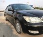 Toyota Camry 2.4G 2002 - Bán Toyota Camry 2.4G năm sản xuất 2002, màu đen số sàn 