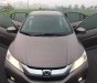 Honda City 2015 - Cần bán xe Honda City đời 2015, màu nâu, giá 390tr xe còn mới nguyên