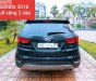 Hyundai Santa Fe 2.4L 4WD 2016 - Cần bán gấp Hyundai Santa Fe 2.4L 4WD năm 2016, màu đen, giá 895tr