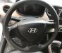 Hyundai Grand i10   2015 - Cần bán Hyundai Grand i10 1.0 MT Base đời 2015, màu bạc, xe nhập, số sàn 