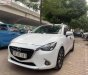 Mazda 2 1.5 AT 2015 - Xe Mazda 2 1.5 AT năm 2015, màu trắng chính chủ giá cạnh tranh