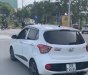 Hyundai Grand i10  1.2 AT 2016 - Cần bán lại xe Hyundai Grand i10 1.2 AT sản xuất 2016, màu trắng, nhập khẩu nguyên chiếc