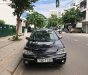 Ford Laser   2004 - Bán Ford Laser GHIA 1.8 AT sản xuất 2004, màu đen, số tự động 