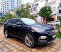 Hyundai Santa Fe 2.4L 4WD 2016 - Cần bán gấp Hyundai Santa Fe 2.4L 4WD năm 2016, màu đen, giá 895tr