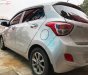 Hyundai Grand i10  1.0 MT 2015 - Cần bán gấp Hyundai Grand i10 1.0 MT năm 2015, màu bạc, nhập khẩu nguyên chiếc 