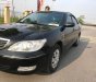 Toyota Camry 2.4G 2002 - Bán Toyota Camry 2.4G năm sản xuất 2002, màu đen số sàn 