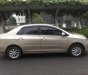 Toyota Vios 1.5E 2014 - Tôi cần bán chiếc xe ô tô Toyota Vios 1.5E màu ghi vàng SX 2014