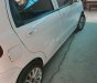 Daewoo Matiz 2004 - Cần bán xe Daewoo Matiz 2004, màu trắng số sàn, 48tr
