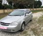 Daewoo Lacetti 2009 - Cần bán Daewoo Lacetti đời 2009, màu bạc