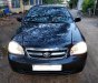 Daewoo Lacetti EX 2011 - Cần bán lại xe Daewoo Lacetti EX sản xuất 2011, màu đen