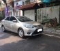 Toyota Vios 1.5E 2016 - Tôi cần bán chiếc xe ô tô Toyota Vios 1.5E màu ghi vàng 2016