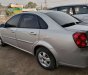 Daewoo Lacetti   2010 - Bán ô tô Daewoo Lacetti sản xuất năm 2010, màu bạc xe gia đình, giá tốt