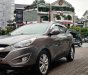 Hyundai Tucson 2.0  2011 - Cần bán xe Hyundai Tucson 2.0 AT 4WD 2011, màu ghi