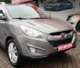 Hyundai Tucson 2.0  2011 - Cần bán xe Hyundai Tucson 2.0 AT 4WD 2011, màu ghi