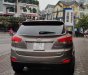 Hyundai Tucson 2.0  2011 - Cần bán xe Hyundai Tucson 2.0 AT 4WD 2011, màu ghi