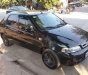 Fiat Albea   2004 - Cần bán xe Fiat Albea sản xuất năm 2004, màu đen xe gia đình