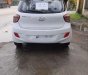 Hyundai Grand i10     2014 - Cần bán Hyundai Grand i10 sản xuất 2014, màu trắng, xe nhập chính chủ, giá tốt