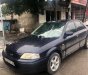 Ford Laser   2000 - Bán ô tô Ford Laser năm sản xuất 2000, màu đen, xe nhập 