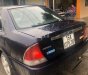 Ford Laser   2000 - Bán ô tô Ford Laser năm sản xuất 2000, màu đen, xe nhập 