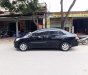 Toyota Vios   2009 - Bán xe Toyota Vios đời 2009, màu đen, số sàn, 205tr