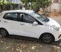 Hyundai Grand i10 2014 - Bán Hyundai Grand i10 sản xuất năm 2014, màu trắng, giá chỉ 230 triệu