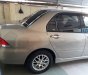 Mitsubishi Lancer 2004 - Bán Mitsubishi Lancer đời 2004, màu vàng, giá chỉ 235 triệu