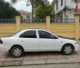 Mazda 323   2000 - Cần bán xe Mazda 323 năm 2000, hai màu trắng đen  