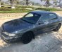 Mazda 626     1997 - Cần bán gấp Mazda 626 sản xuất 1997, màu xám, nhập khẩu số sàn