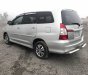 Toyota Innova E 2015 - Cần bán lại xe Toyota Innova E sản xuất năm 2015, màu bạc