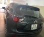 Mazda CX 5   2014 - Cần bán lại xe Mazda CX 5 năm sản xuất 2014, màu đen, 580 triệu