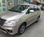 Toyota Innova   2015 - Bán Toyota Innova đời 2015, màu ghi vàng, số sàn