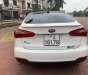 Kia K3   2014 - Cần bán lại xe Kia K3 2014, màu trắng, xe gia đình, 400tr