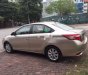 Toyota Vios 2015 - Cần bán xe Toyota Vios năm sản xuất 2015, màu vàng giá cạnh tranh