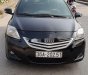 Toyota Vios 2009 - Cần bán xe Toyota Vios năm 2009, màu đen xe gia đình