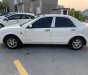 Mazda 323F 2004 - Cần bán gấp Mazda 323F GLX đời 2004, màu trắng