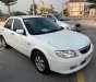 Mazda 323F 2004 - Cần bán gấp Mazda 323F GLX đời 2004, màu trắng