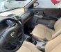 Mazda 323F 2004 - Cần bán gấp Mazda 323F GLX đời 2004, màu trắng