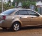 Daewoo Lacetti 2005 - Cần bán Daewoo Lacetti năm sản xuất 2005, màu vàng, xe nhập, 150tr