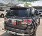 Toyota Fortuner 2015 - Cần bán gấp Toyota Fortuner sản xuất năm 2015, màu đen còn mới, giá 645tr