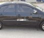 Toyota Vios 2009 - Cần bán xe Toyota Vios năm 2009, màu đen xe gia đình